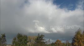 Stunning timelapse of a rainbow among Cumulonimbus clouds