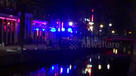 Firemen rescue prostitute in Amsterdam's red light district