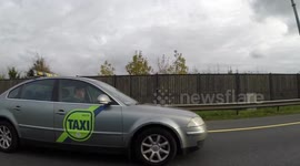 05KE11172 TAXI 20219 driver on the Phone