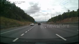 Stupid Driver nearly causes accident/pileup.