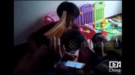 Boy, 2, gets his head stuck in a chair