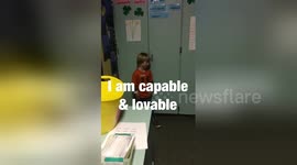 Inspirational six-year-old boy with Down's syndrome leads class poem recital