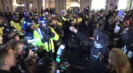 Police officer hit in face with glass bottle in Anonymous Million Mask March