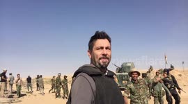 Happy Iraqi soldiers destroy reporter