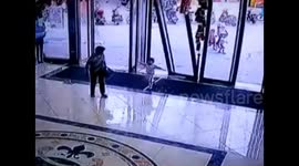 Girl, three miraculously survives being knocked down by glass door