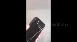 Designers test out 'invincible' iPhone case by throwing phone around store