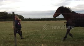 Lizzie Running to the Gate with her Pony Nutty.