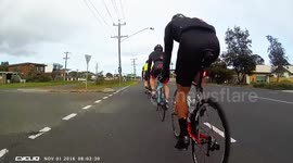 Nasty cycling crash sends one man flying over another