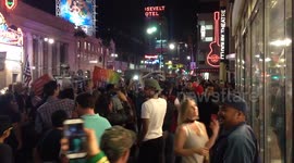 Anti-Trump protesters shout at supporters on Hollywood Boulevard