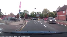 Near miss as car pulls onto roundabout without checking