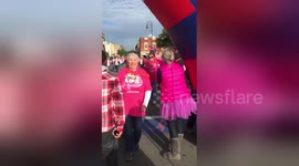 Man proposes to girlfriend at finish line of Breast Cancer Walk