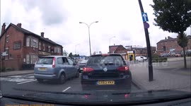 Driver throws litter from car and is confronted **Warning - Swearing and bad language**