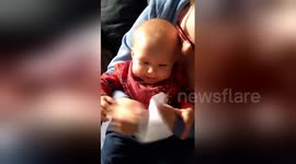 Newsflare Edit - Baby Dexter Hysterical Laughing at Paper