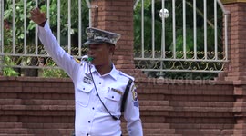 Burmese traffic cop in action