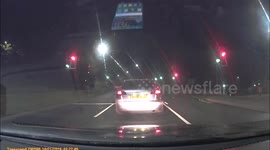 Car jumps a red light