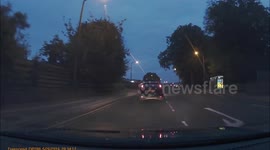 Whoops! - Car drives straight through red light
