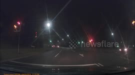 Car goes straight through a redlight