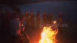 Backflip over fire nearly sets head on fire !