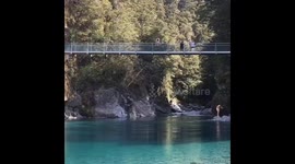 Backflipping into Icecold glacial waters from a very high bridge!