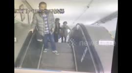 Nuisance man jumps on escalator and causes it to stop suddenly