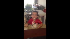 Funny Toddler making a mess during mealtime