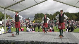 Braemar Gathering 2016 - Triplet brothers Fergus, Angus & Fraser Wood competing in the Sword dance