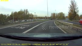 Dash cam video,van driver undertakes to gain one place in front,going nowhere,