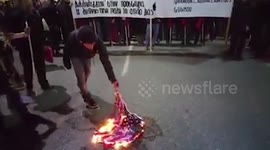 Protesters burn American flag during Obama's visit in Greece