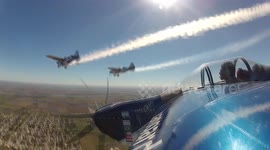 Pilots perform stunts with chained aircrafts