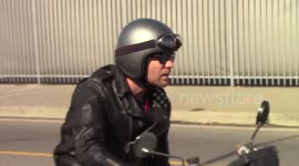 Ewan McGregor plays a bit of Easy Rider as he is spotted riding his motorcycle through the streets of Brentwood, Ca
