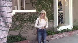 Actress Emma Roberts heads to her car  as she is spotted in West Hollywood, Ca