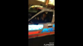 Cop dances with teenagers