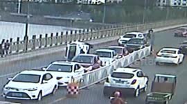 Car flips over because driver plays with phone while driving