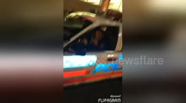 Newsflare Edit - Cop dances with teenagers