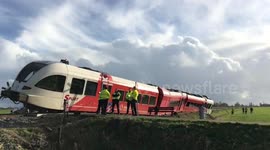 Train derails after colliding with truck in the Netherlands