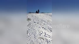 Boy crashes into bushes during first solo sledge run