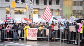 Pro and anti Trump supporters collide during an anti-Trump Rally at Nathan Phillips Sq. in Toronto on Saturday November 19, 2016.
