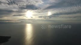 Beautiful Sunhalo captured with drone on the sea Brazil Florianopolis