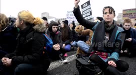 Domestic violence protest blocks Waterloo bridge