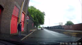 Helping an Old Man Through a Flood - Dashcam