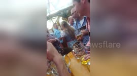 Newsflare Edit - Crazy drunk guy piercing his nipples at Oktoberfest