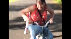 Julie riding a bike