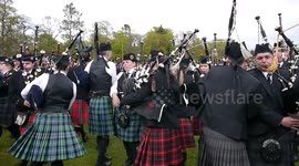 Massed pipe bands find little space during end of competition parade in Banchory