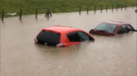Submerged cars during flooding in Bristol, UK
