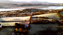 SUNRISE OVER THE HILLS OF FERMANAGH OVER LOOKING A FOGGY BALLYSHANNON THIS MORNING
