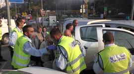 Elderly people evacuated by police and taken to public shelters in Haifa, Israel.