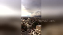 Churning storm front plows into Salt Lake Valley