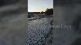 Rare 'Pancake Ice' Formations On River
