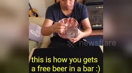 Magician shows how to get a free drink in a bar