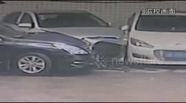 Car slides down slope, hits three cars and injures baby